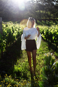 At The Imperial Linen Blouse: L Dor Raw Luxury